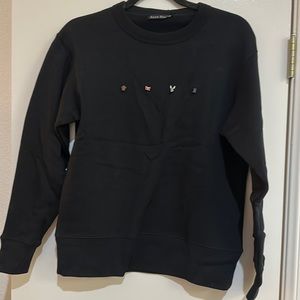 Acne studio sweatshirt with animal pin